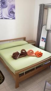 Posteľ alebo postele v izbe v ubytovaní Casa Vacanze Cayohouse