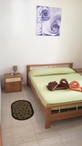 Posteľ alebo postele v izbe v ubytovaní Casa Vacanze Cayohouse