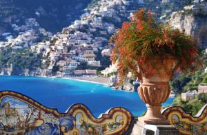 a vase with flowers on top of it at Il San Pietro di Positano in Positano