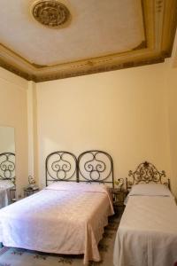 A bed or beds in a room at ERCTA