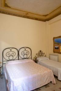 A bed or beds in a room at ERCTA