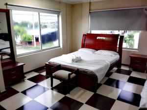 Postel nebo postele na pokoji v ubytování Hotel Prado Country