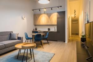 Kuchyň nebo kuchyňský kout v ubytování Apartment Hotel Laisve