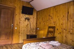 Postel nebo postele na pokoji v ubytování Kryvorizka Palanka