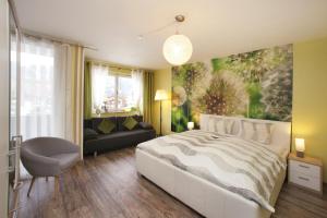 Posteľ alebo postele v izbe v ubytovaní Kaprun Apartments