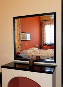 Een bed of bedden in een kamer bij Aeriko - Benovias