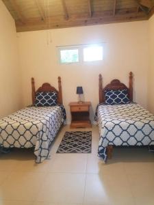 A bed or beds in a room at MoBay Las Palmas