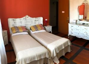 Voodi või voodid majutusasutuse B&B Via Roma toas