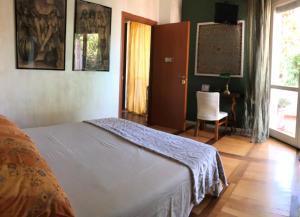 Voodi või voodid majutusasutuse B&B Via Roma toas