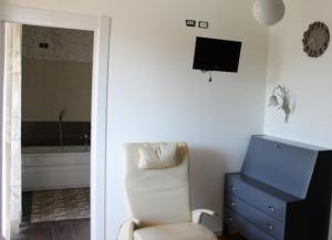 Televiisor ja/või meelelahutuskeskus majutusasutuses B&B Via Roma