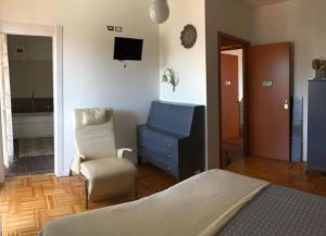 Televiisor ja/või meelelahutuskeskus majutusasutuses B&B Via Roma