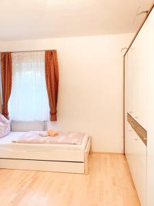Postel nebo postele na pokoji v ubytování Pension Huber