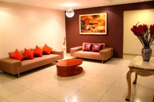 A seating area at HOTEL Javier Prado Inn