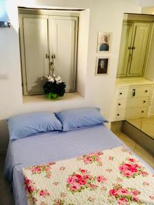 Ένα ή περισσότερα κρεβάτια σε δωμάτιο στο Le Déjà Vue