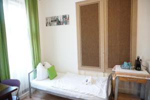 Postel nebo postele na pokoji v ubytování Contactless Check-In Room4You Währing + 4 fotografie