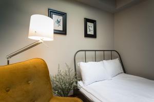 Łóżko lub łóżka w pokoju w obiekcie Apartamenty na Starówce / Old Town apartments