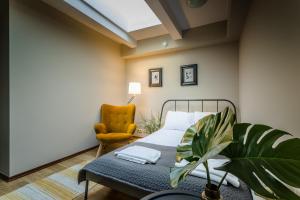 Łóżko lub łóżka w pokoju w obiekcie Apartamenty na Starówce / Old Town apartments