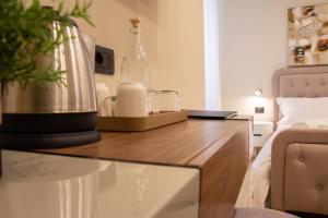 A kitchen or kitchenette at Prati 25.7 Suites in Rome