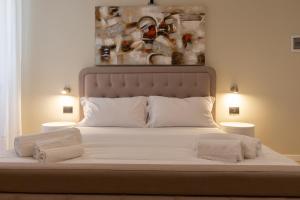 A bed or beds in a room at Prati 25.7 Suites in Rome