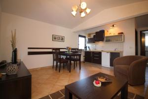Kuchyňa alebo kuchynka v ubytovaní Dr. IGDA Apartments