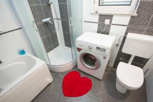 Kúpeľňa v ubytovaní Apartment Pico Bello + 30 fotografií