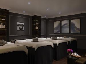 Voodi või voodid majutusasutuse Grande Collection Hotel & Spa toas