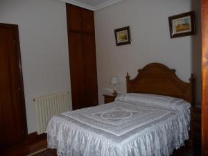 Postel nebo postele na pokoji v ubytování Pension Lorea