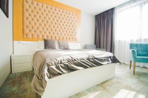 Posteľ alebo postele v izbe v ubytovaní Hotel Sjesta