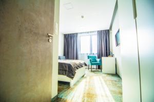 Posteľ alebo postele v izbe v ubytovaní Hotel Sjesta