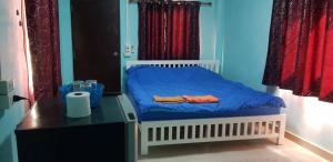 Voodi või voodid majutusasutuse Nattamon Khao Kho Resort toas
