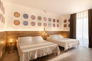 Postel nebo postele na pokoji v ubytování Filinona B&B