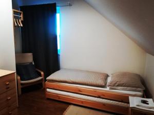 Postel nebo postele na pokoji v ubytování Apartmány Réví