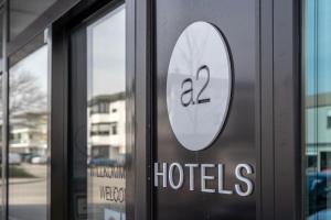 Ein Zertifikat, Auszeichnung, Logo oder anderes Dokument, das in der Unterkunft a2 HOTELS Denkendorf - Airport & Messe ausgestellt ist