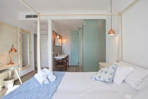 Posteľ alebo postele v izbe v ubytovaní Boutique Hotel Petit Sant Miquel