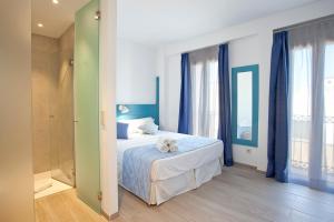 Posteľ alebo postele v izbe v ubytovaní Boutique Hotel Petit Sant Miquel