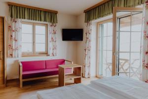 Postel nebo postele na pokoji v ubytování Winzerhaus am Gamlitzberg