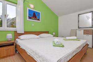 Postel nebo postele na pokoji v ubytování Holiday home Colla