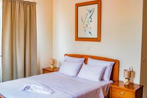 Łóżko lub łóżka w pokoju w obiekcie Hotel Vitoria