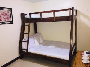 Postel nebo postele na pokoji v ubytování JaiJai's Backpackers Inn