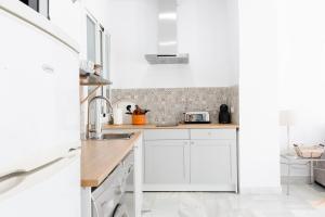 Kuchyňa alebo kuchynka v ubytovaní Loft en primera linea del paseo marítimo
