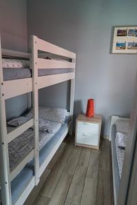 Krevet ili kreveti na sprat u jedinici u okviru objekta Domki Babie lato