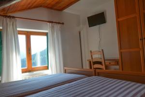 Postel nebo postele na pokoji v ubytování Albergo Miravalle