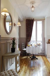 Posezení v ubytování Chambre d hôte : Louvre Elegant Apt Suite