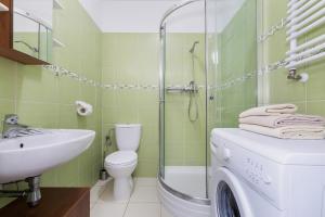 Kúpeľňa v ubytovaní Jantar Apartamenty- Zielone Tarasy