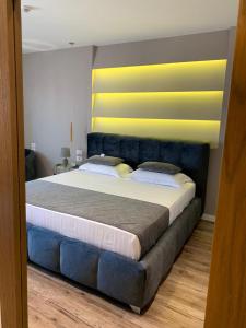 Postel nebo postele na pokoji v ubytování Light Hotel