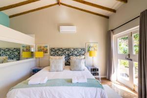 Ένα ή περισσότερα κρεβάτια σε δωμάτιο στο Skyview Manor