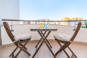 A balcony or terrace at Green Cactus cosy Loft, Wifi & Gym