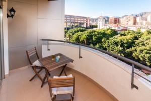 A balcony or terrace at Green Cactus cosy Loft, Wifi & Gym