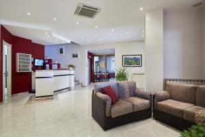 The lobby or reception area at Santa Caterina Hotel & Bike