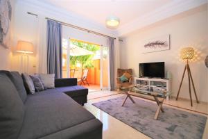 Televízia a/alebo spoločenská miestnosť v ubytovaní Apartment NALA